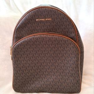 Pre-loved Michael Kors Brown Large Backpack